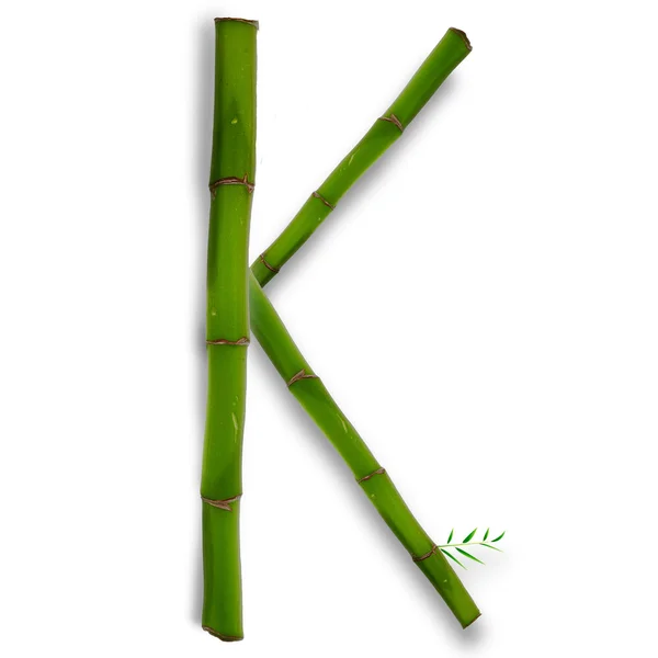 One capital letter of bamboo alphabet with shadow over white — Stock Photo, Image