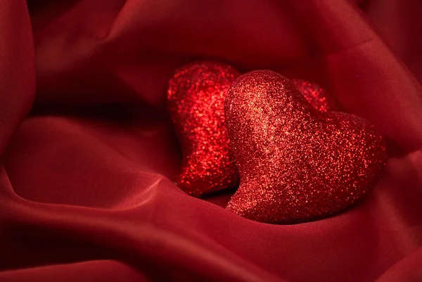 Resumen Fondos de San Valentín sobre textil rojo con tho corazón — Foto de Stock