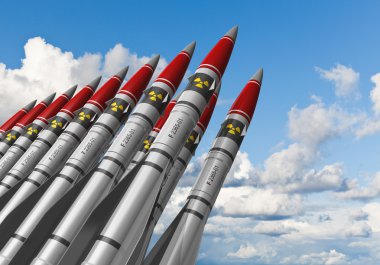 Nuclear missiles against blue sky clipart