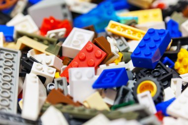 Heap of color plastic toy bricks clipart
