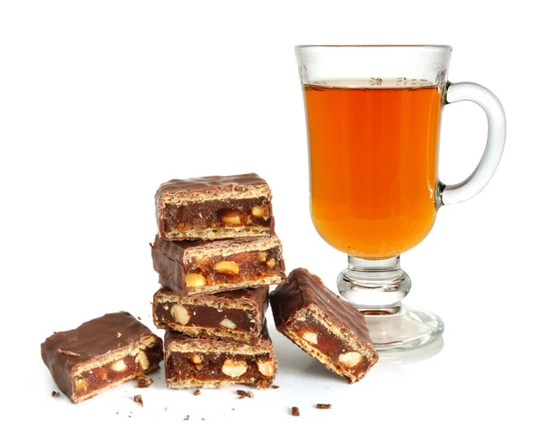 Hromadu zlomené čokolády a čaje — Stock fotografie