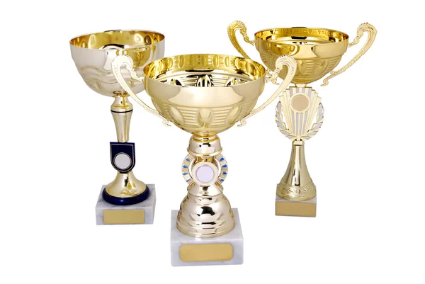 Three golden cups — Stock Photo, Image