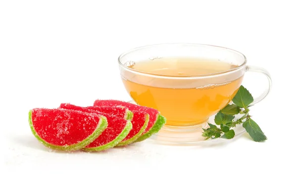 Gummy candy and mint tea — Stock Photo, Image
