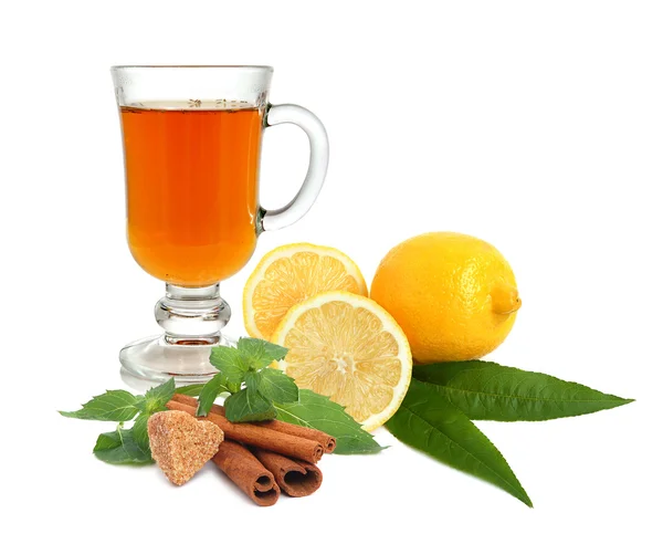 Te med citron, socker, kanel och mynta — Stockfoto
