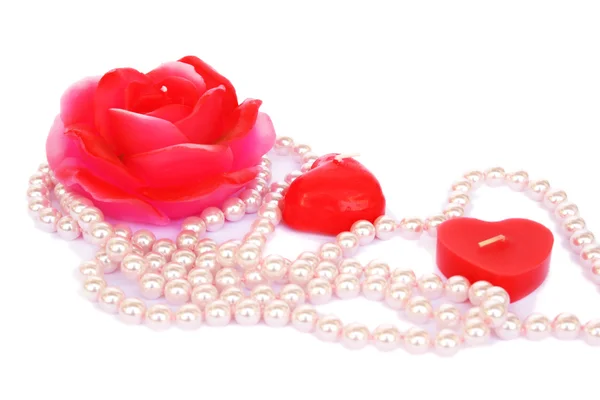 Červené svíčky a náhrdelník — Stock fotografie