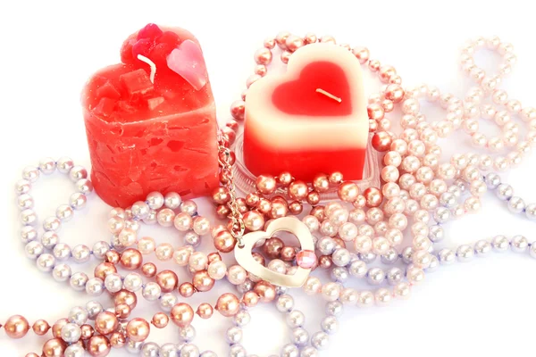 Red candles and necklaces — Stock Photo, Image