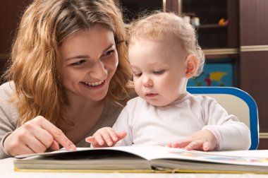 Mother and baby reading clipart