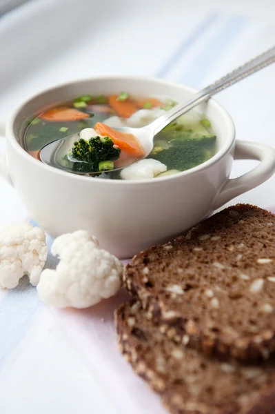 stock image Healthy soup with wholemeal bread