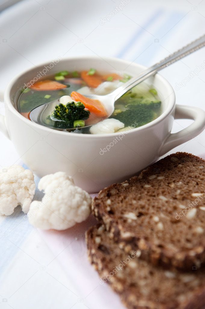 Healthy soup with wholemeal bread