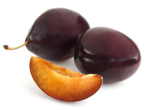 Sweet plums with slice — Stock Photo, Image