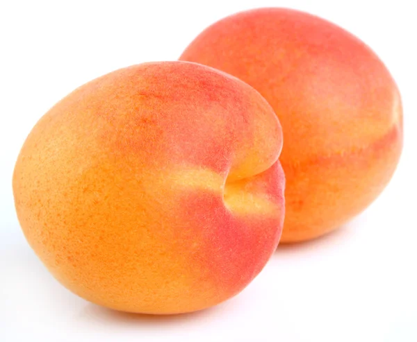 Два абрикоса — стоковое фото
