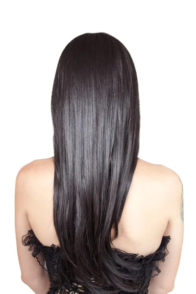 Widok z tyłu młoda kobieta z czarny jedwabisty włos — Zdjęcie stockowe