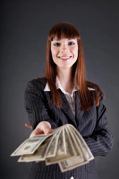 Fröhliche Geschäftsfrau mit Dollars — Stockfoto