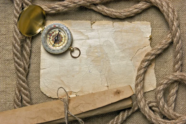 Old paper with compass and rope