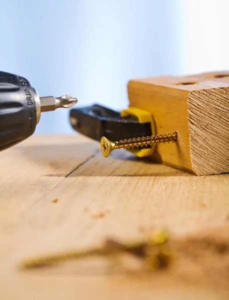 stock image Screw in the wooden plank