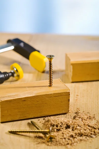 Wooden plank with screw — Stock Photo, Image