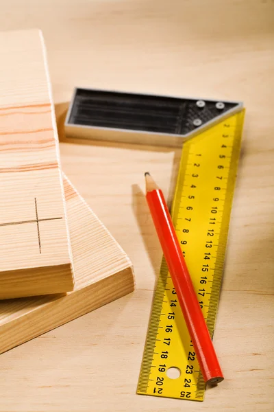 Set-square ruler and pencil with boards — Stock Photo, Image