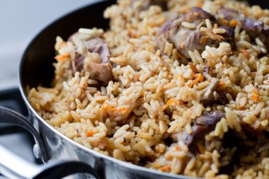 Pilaf (meat of a ram paella) clipart