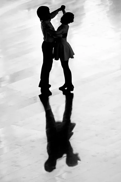 Boy and girl waltzing — Stock Photo, Image