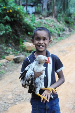 Boy with chicken clipart