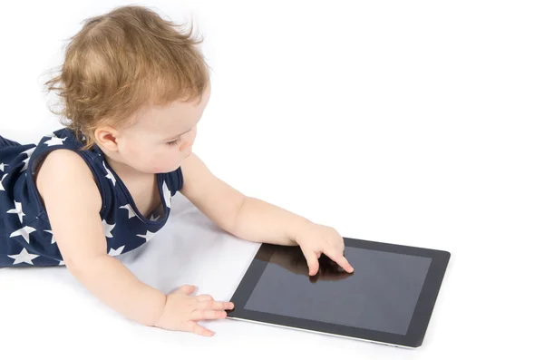 Baby spielt mit Tablet — Stockfoto