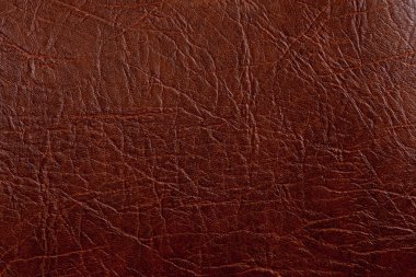 Brown leather texture closeup. Useful as background for design-w clipart