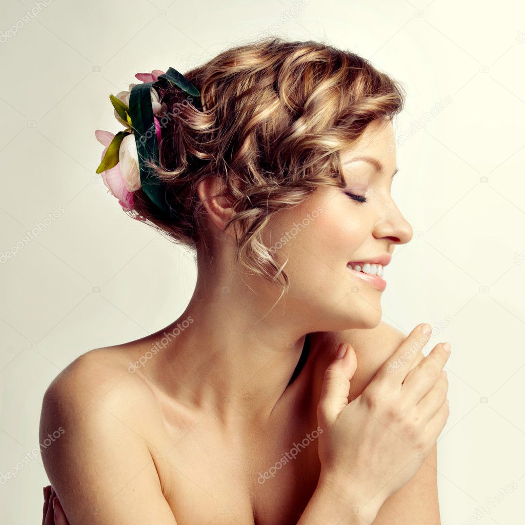 Beauty woman portrait, hairstyle with flowers
