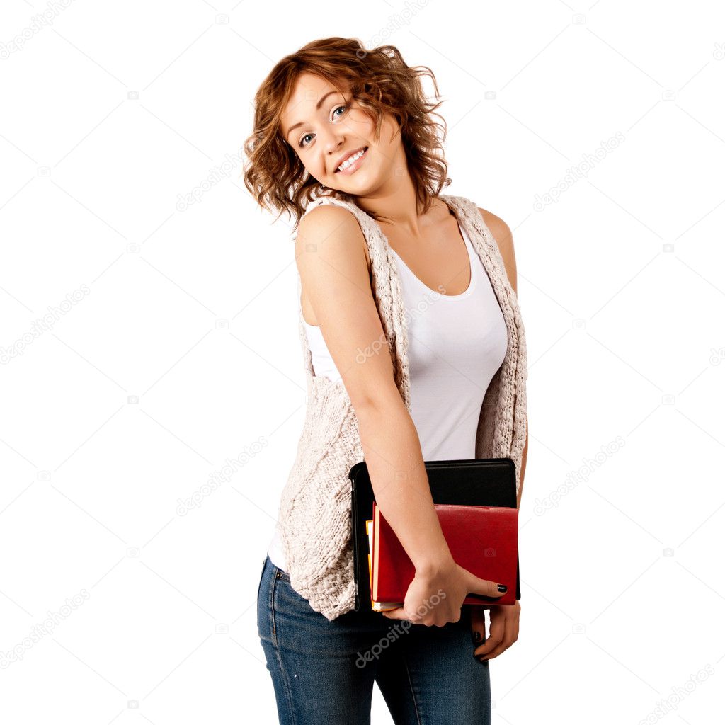 Happy young student girl holding books