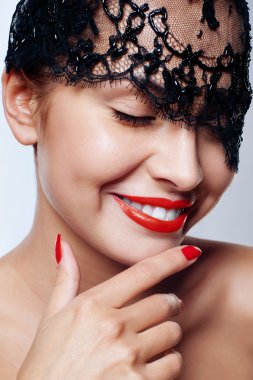 Beautiful woman with red lips and lace mask over her eyes. clipart