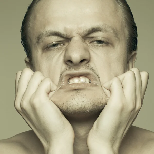 Portrait of man stretching his face concept — Stock Photo, Image