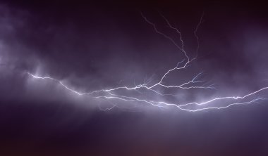 Lightning strike in the darkness clipart