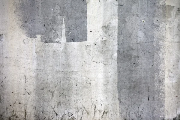 Grunge revnet betonvæg - Stock-foto