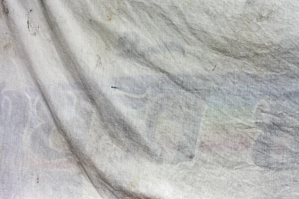 Gamla smutsiga vitt tyg med vågor — Stockfoto