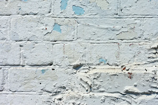 Weiße strukturierte Ziegelsteinwand bemalt — Stockfoto