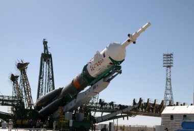 Soyuz Rocket Erection on the Launch Tower clipart