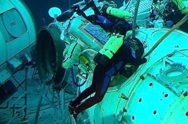 Michael Barratt is training for spacewalks in the Russian Hydrol clipart