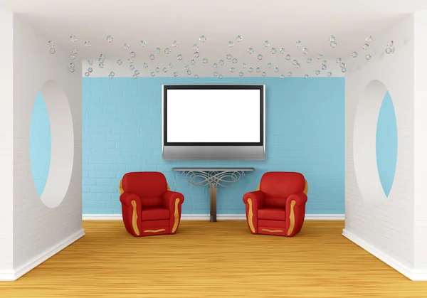 Зал галереи с красными стульями, металлическим столом и плоским телевизором — стоковое фото