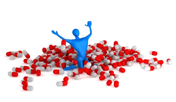 Счастливый 3D человек среди таблеток — стоковое фото