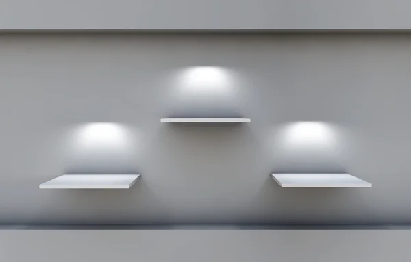 Trzy półki 3d i reflektory na wystawie w szare wnętrze — Zdjęcie stockowe