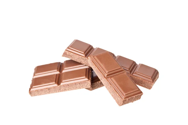 Chocolate pieces on the white background — Stock Photo, Image