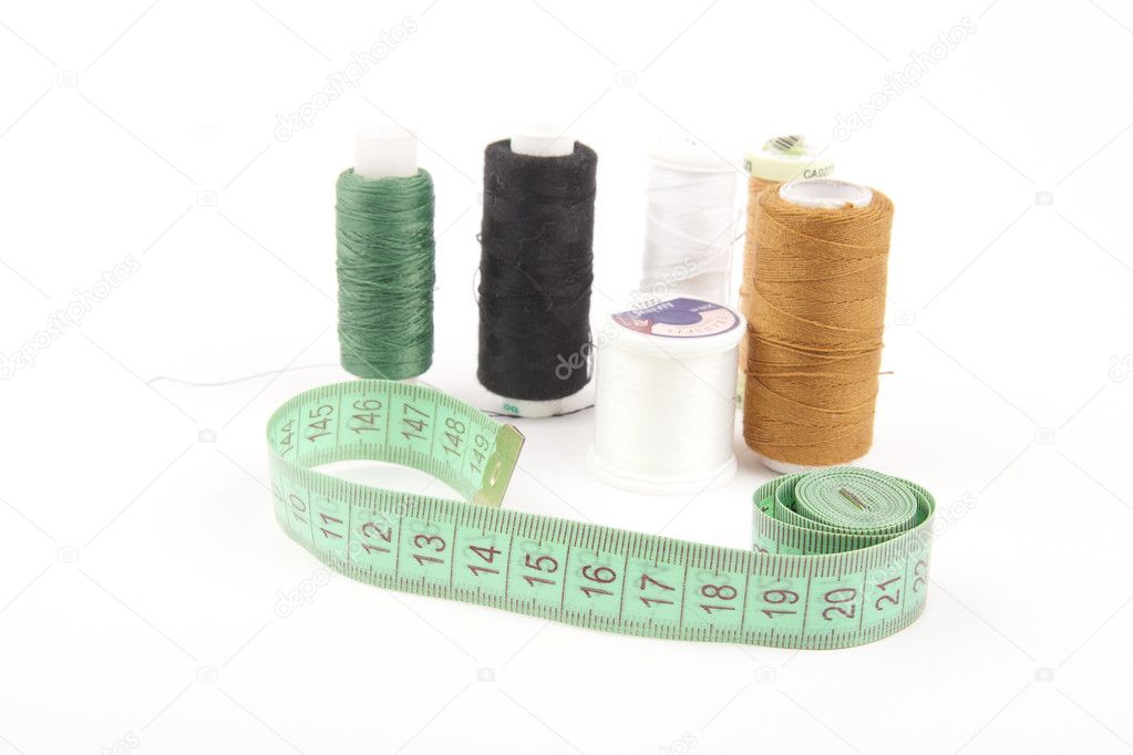 Coloured bobbins of thread