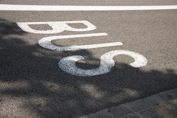 BUS marking on the asphalt — Stock Photo, Image