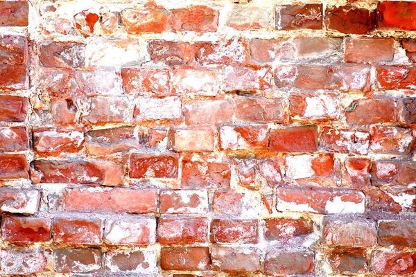 Verwitterte gefärbte alte rote Backsteinmauer Hintergrund — Stockfoto