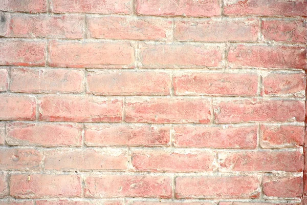 風化した古い赤レンガの壁の背景 — ストック写真