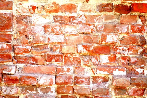 Weathered stained old red brick wall background — Stock Photo, Image