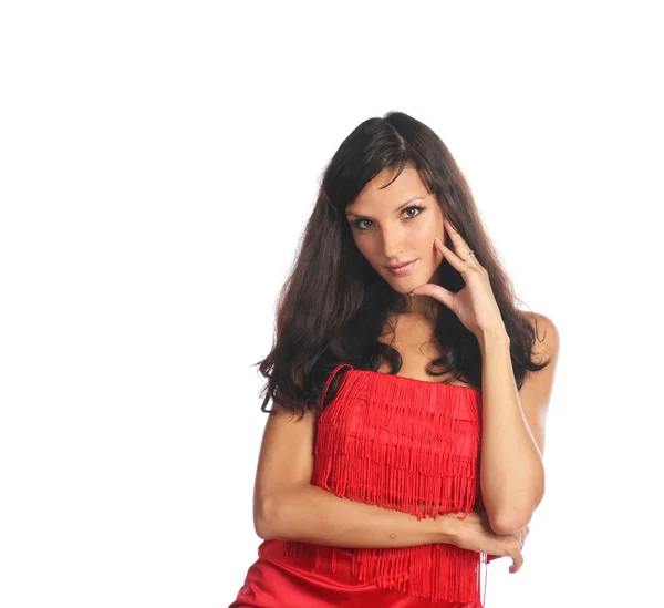 Portret van een mooie jonge vrouw in rode jurk. — Stockfoto