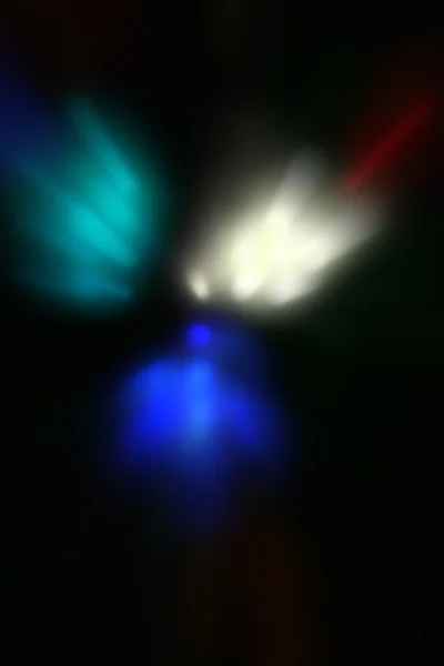 รูปภาพของจุดไฟนีออนดิสโก้เบลอ — ภาพถ่ายสต็อก