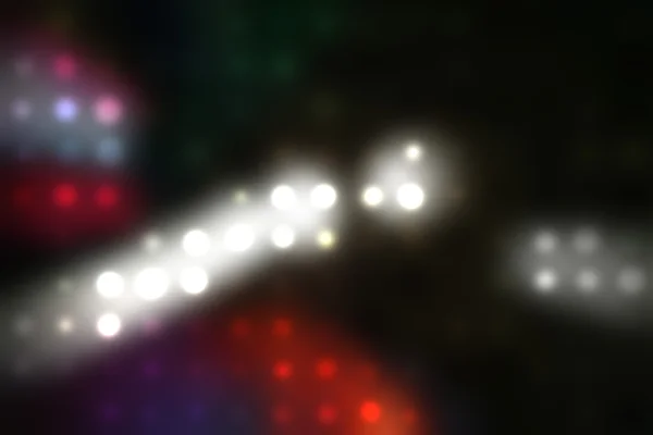 Illustration av suddig neon disco ljus prickar — Stockfoto
