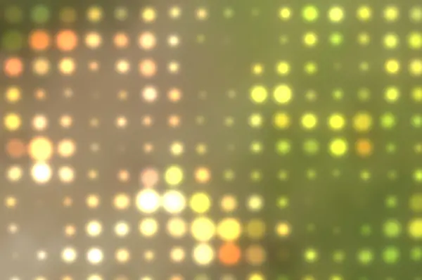 Background with out of focus light dots in green — Stock Photo, Image