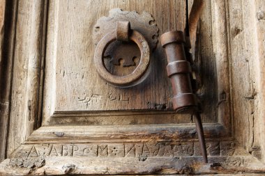 Door to the church of the Holy Sepulchre clipart